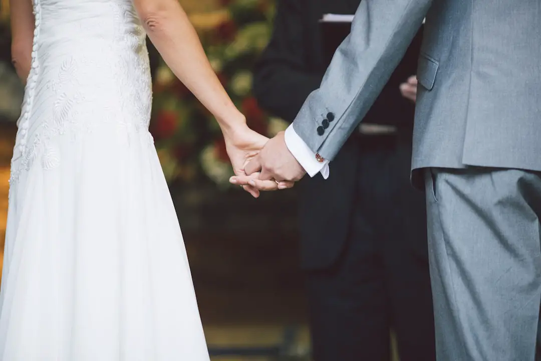 man holding a woman's hands in front of a person