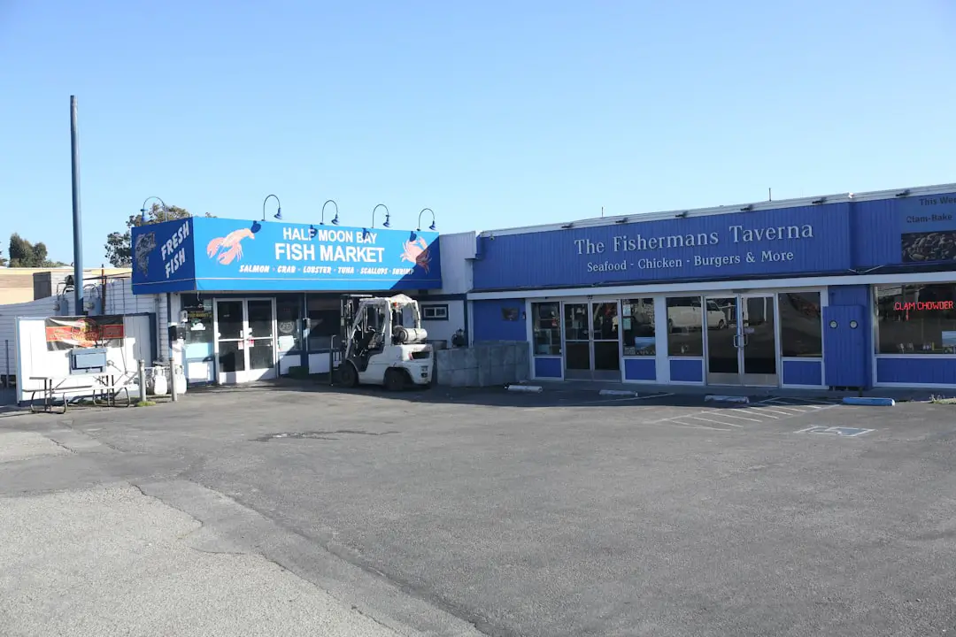 An empty parking lot in front of a business