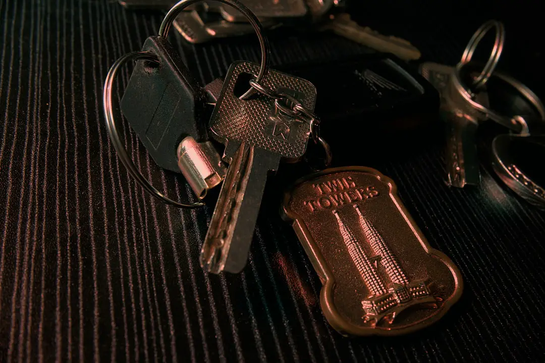 Keys with a twin towers keychain are visible.