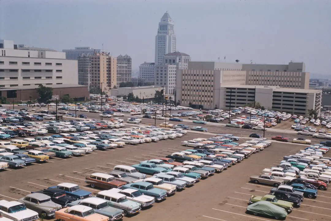 a parking lot filled with lots of parked cars